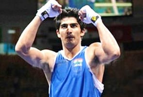 Warnings knock Vijender out of CWG, three Indians in finals