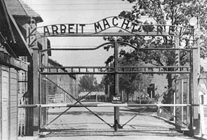 Poland charges 3 men in theft of Auschwitz sign