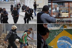 Brazil police swarm gang haven in Rio