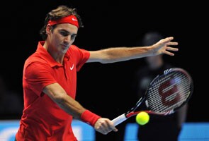 Federer defeats Djokovic to set up Nadal clash