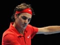 Federer defeats Djokovic to set up Nadal clash