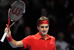 Federer turns on the style to rout Murray  
