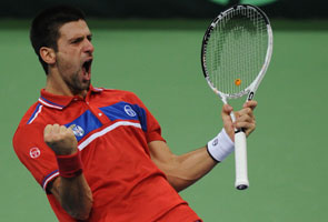 Djokovic, Troicki give Serbia first Davis Cup title