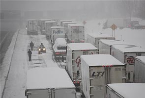 Drivers stranded on freeways in snowstorms