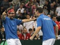 Comeback kings Clement, Llodra put France in charge
