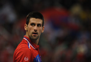 Djokovic fireworks bring Serbia level with France