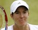 Henin not expecting miracles after elbow injury