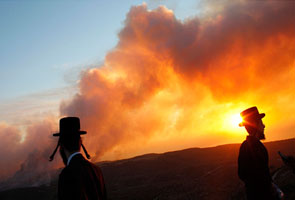 Israel calls for urgent help fighting lethal fire