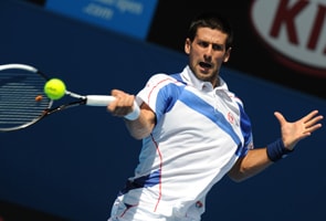 Dazzling Djokovic into Open quarters