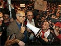 Opposition rallies to ElBaradei as military reinforces in Cairo