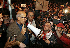 Opposition rallies to ElBaradei as military reinforces in Cairo