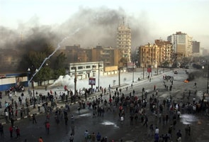 Egypt unrest escalates, ElBaradei returns