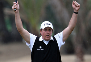 Mickelson, Haas lead while Woods flounders