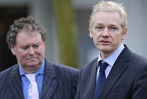 Assange threatens to sue British daily over book that claims he is ill-tempered