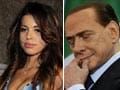 Berlusconi to face trial in underage prostitution case