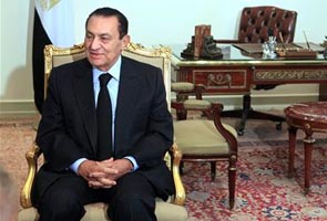 Mubarak banned from leaving Egypt, assets frozen