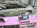 Caught on camera: Minivan crashes into coffee shop