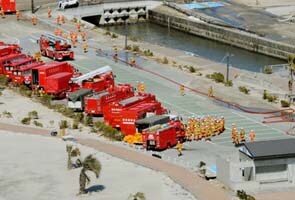 Japan raises warning level on nuclear crisis Japan raises warning level on nuclear crisis
