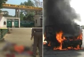 Four arrested for setting steel executive on fire
