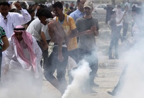 Bahrain unrest: Protesters cut off country's financial centre
