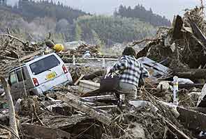 Death toll from Japan quake, tsunami tops 10,000