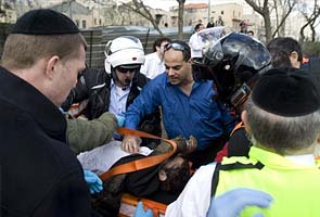 Explosion rocks Jerusalem bus stop; 25 wounded 
