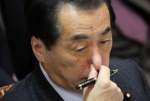 Japan PM says won't resign over foreign donations 