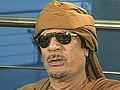Interpol issues alert for Gaddafi, associates