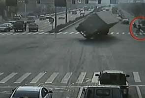 Catch: Narrow miss for cyclist as lorry overturns