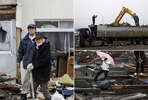 Careful search for mementos slows Japan rebuilding 