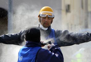 Workers enter Japan nuclear reactor building