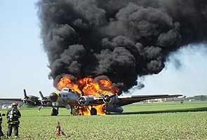 Vintage World War II plane catches fire, 7 onboard escape unhurt