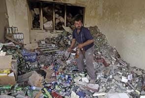 Blasts rip through western Baghdad, killing 40 
