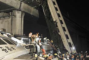 China: Bullet trains derail, 35 dead