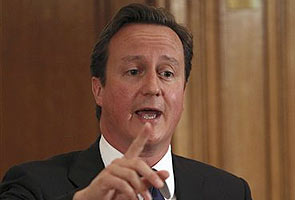 Cameron orders judicial inquiry into phone hacking scandal