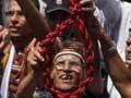 Egypt PM sacks police officers accused of killing protesters
