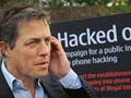 Hugh Grant says police want talk to him on hacking