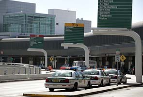 Two men accused of attacking pilot at Miami airport