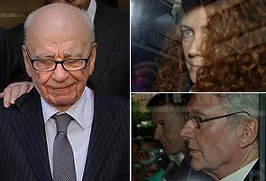 2 top deputies resign as crisis isolates Murdoch