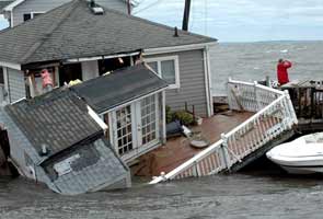 Hurricane Irene's toll rises to 21; Obama says the ordeal is not yet over