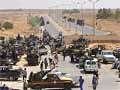 Libya: Anti-Gaddafi fighters capture Sirte's port