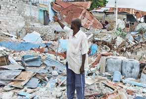 Somalis slowly return to ruined homes in capital