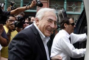 Dominique Strauss-Kahn heads back to France