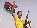 Libyan fighters say Gaddafi surrounded