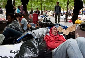 Complaints arise on Wall Street protesters, dilemma of dealing with them