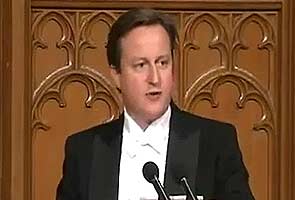 British Prime Minister David Cameron imitates Julia Gillard