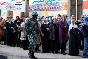 Long lines form as Egyptians vote in historic election
