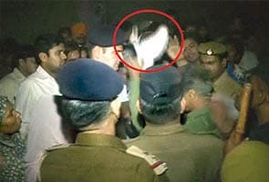 IAS officer hits himself with his shoe
