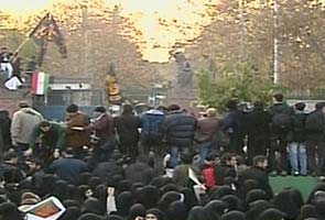 Iranian students storm UK Embassy in Tehran; reports say six taken hostage