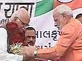 Advani's yatra enters Gujarat; shares stage with Modi